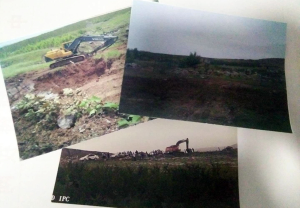 图为被毁坏的荒山现场